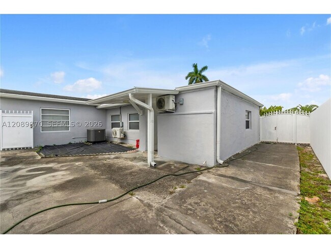 Building Photo - 6049 W 14th Ln