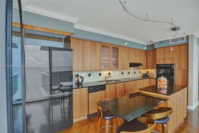 Building Photo - 19111 Collins Ave