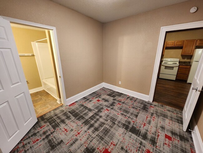 Building Photo - 4 Bedroom, 2 Bathroom home with large yard...