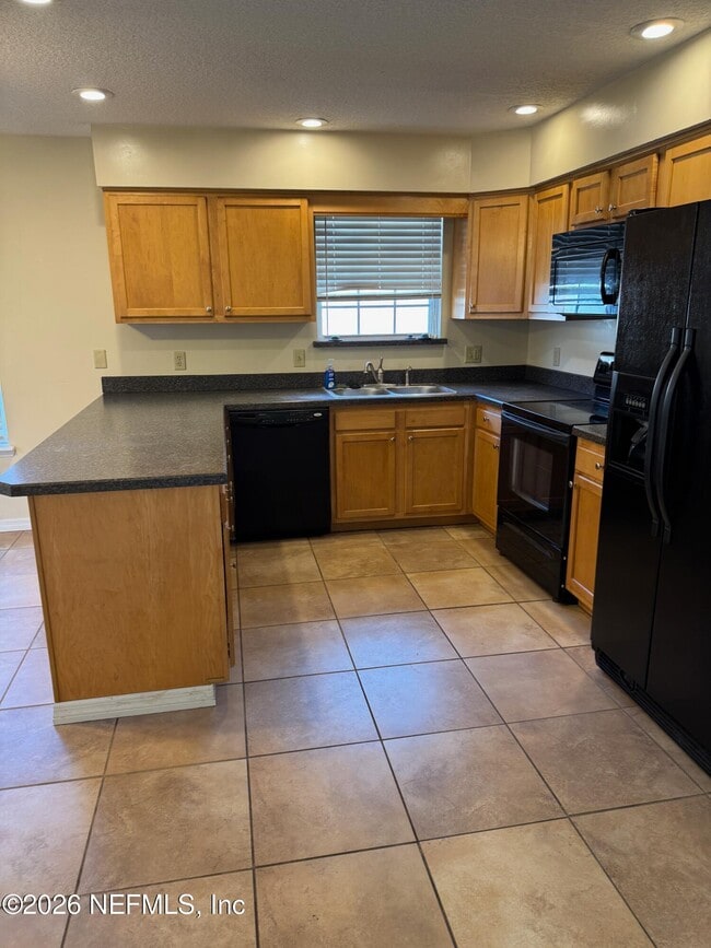 Building Photo - 6725 Newgate Cir E