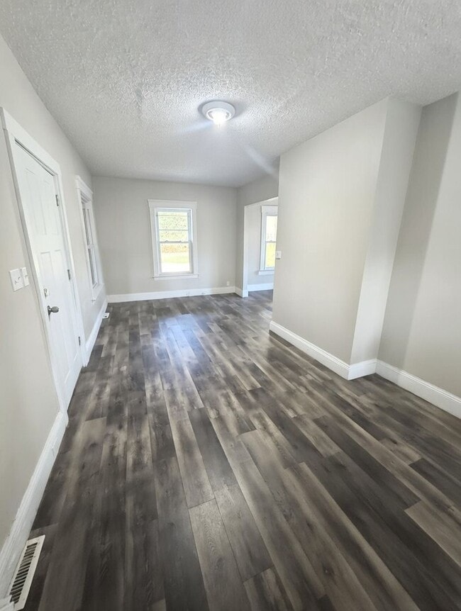 Building Photo - Charming Cape Cod Home with Character and Potential