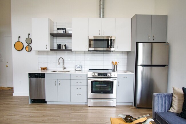 Building Photo - Sleek & Modern Studio w/Condo-Grade Finishes + Patio!