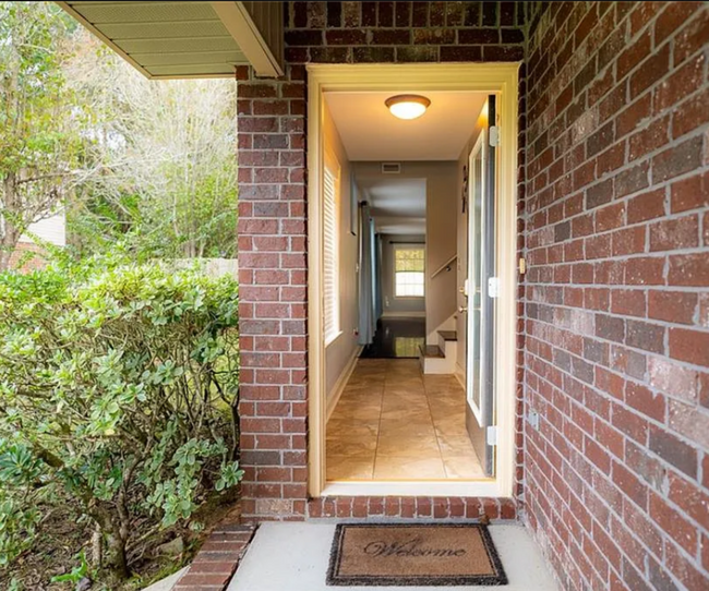 You enter the home from a beautiful hallway leading to the living room. Looking East - 12366 Copperwood Dr