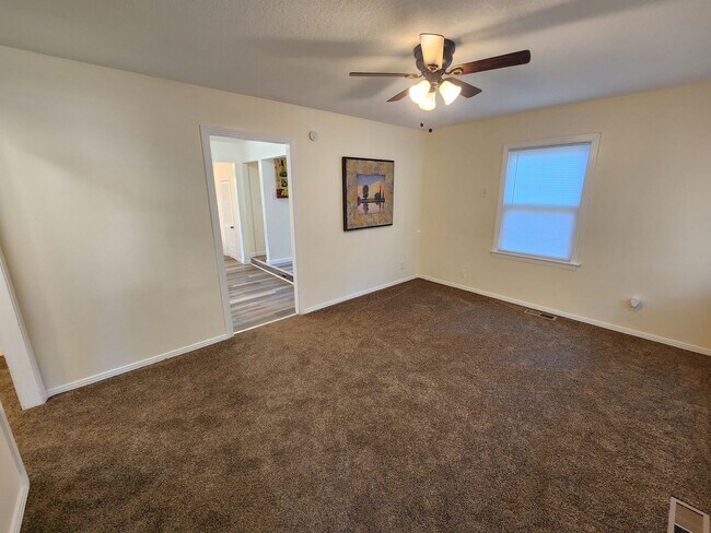 Building Photo - Beautiful remodeled 3BR, 1.5 Bth with garage and fenced backyard with newer stainless appliances