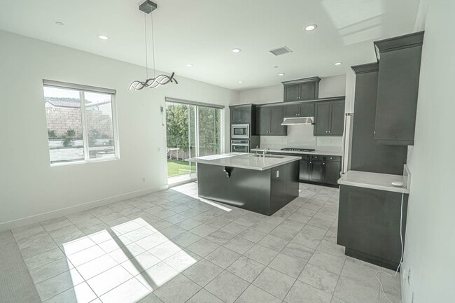 Building Photo - 5-Bedroom Home with Loft in Gated Victoria at Plum Canyon!