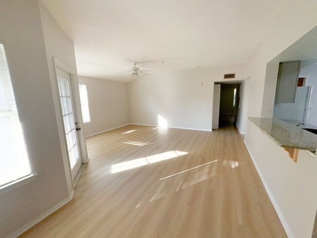 Building Photo - NEW-Remodeled bathroom & kitchen! NEW VINYL PLANK flooring & fresh paint! 2 bedroom 1 bath condo ...