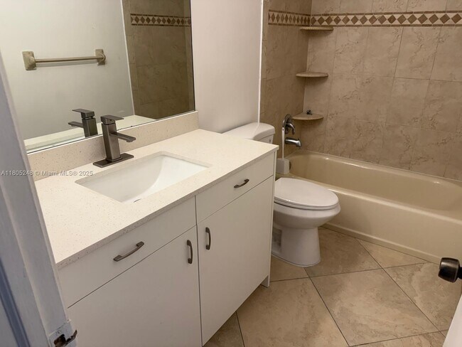 Building Photo - 3111 Coral Springs Dr