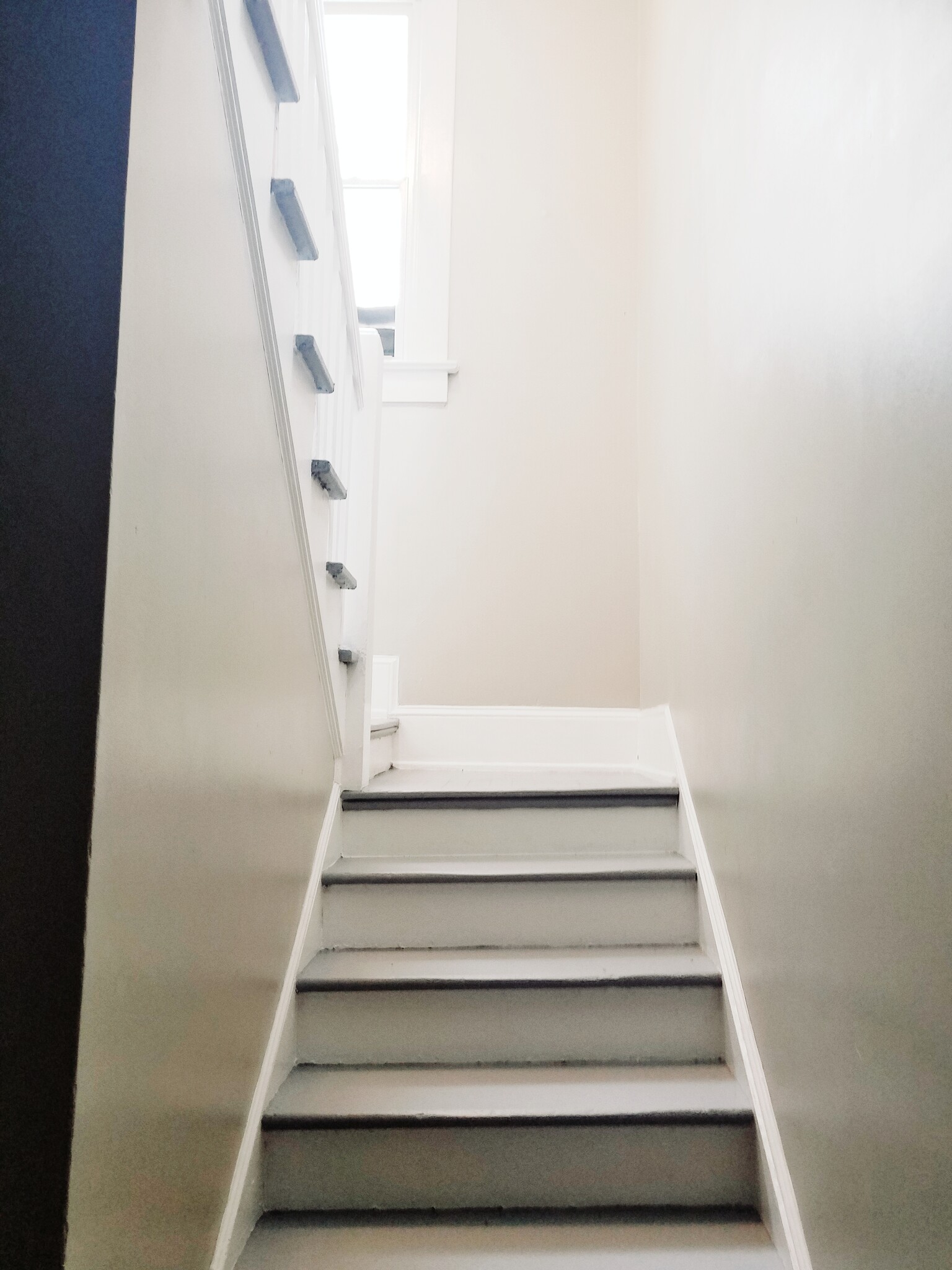 Private staircase from the foyer/mud room to the living area - 1755 Marietta Rd NW