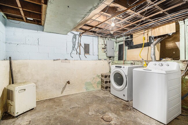 Laundry in Basement - 620 McCourtie St