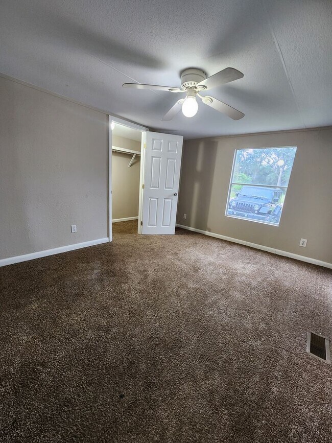 Building Photo - 3 bed, 2 bath w/ Front & Back Decks, 1/4 Acre of land, FENCED backyard