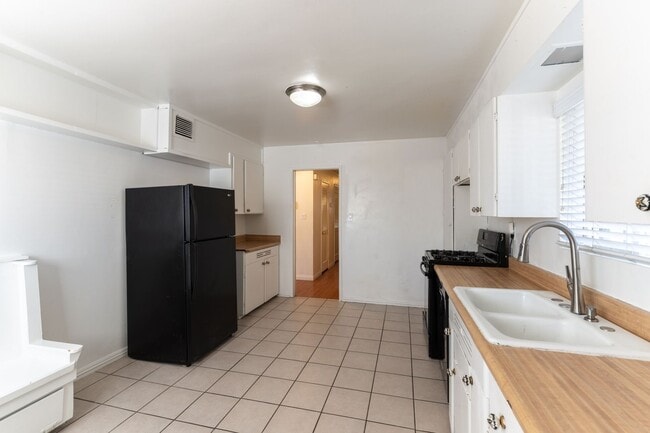 Building Photo - Historic Neighborhood + Utilities Included | 3BR with Backyard Oasis and Detached casita