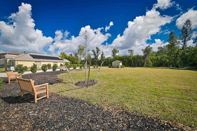 Building Photo - AVAILABLE May 1 - Single Family Pool Home in the Heart of Three Oaks