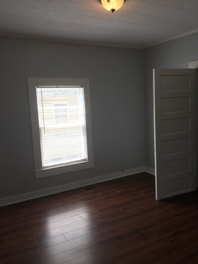 Building Photo - Your Own Home and Yard Centrally Located 3...