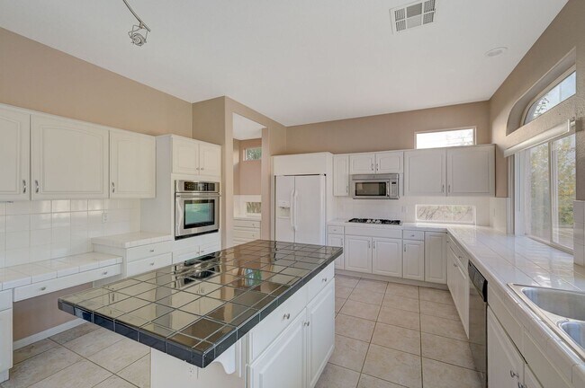 Building Photo - Stunning Green Valley home with a pool in guard gated Legacy