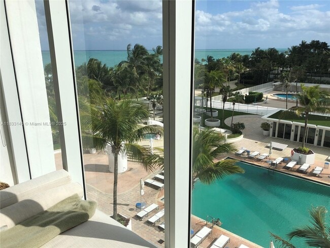 Building Photo - 10275 Collins Ave