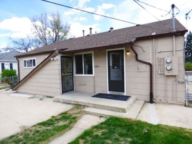 Back door and stairwell to unit, separate patio - 2261 Newark st