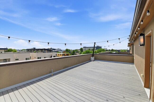Building Photo - $2,890.95, 2-bed, 2.5-bath, located in Denver with a rooftop terrace.