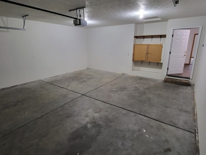 Garage Storage and Entry to House - 2675 N National Ave