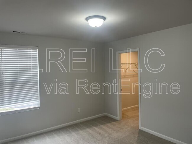Building Photo - 9211 Tamarack Grove Ln
