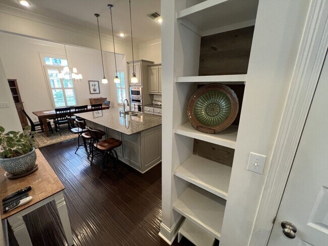Building Photo - Luxury 4BR Home in Americana | 11 Ft Ceilings, Courtyard Living & Furnished Option