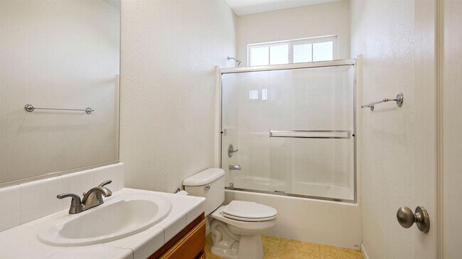 Building Photo - ADORABLE 4 BED/2.5 BATH TOWNHOME WITH CORNER LOT AND LARGE FENCED REAR YARD WITH PATIO