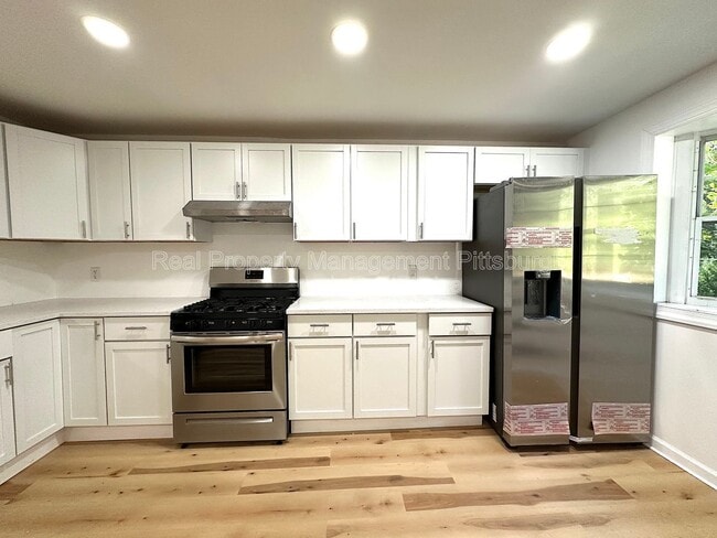 Building Photo - 6174 Poketa Rd