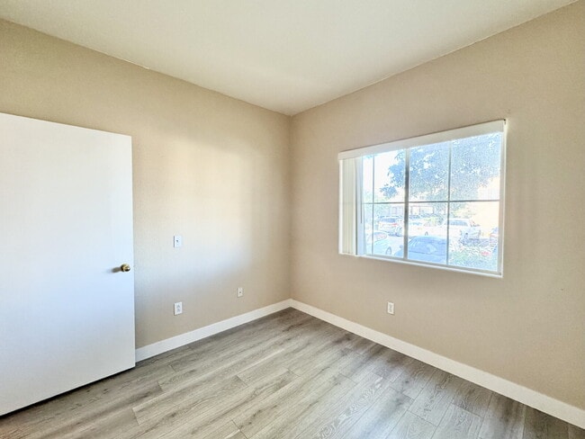 Building Photo - DOWNSTAIRS CONDO | GATED COMMUNITY | CENTENNIAL HILLS | UPDATED 3 BEDROOM