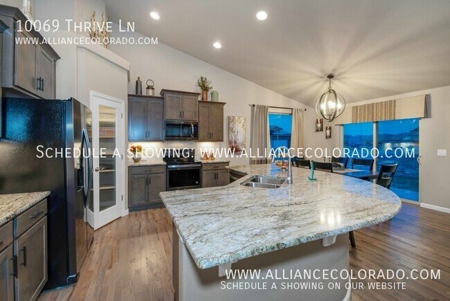 Building Photo - 10069 Thrive Ln