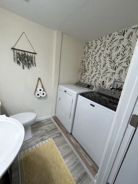1st floor half bath with washer and dryer hook ups. Washer and dryer not included - 19D Sigourney St
