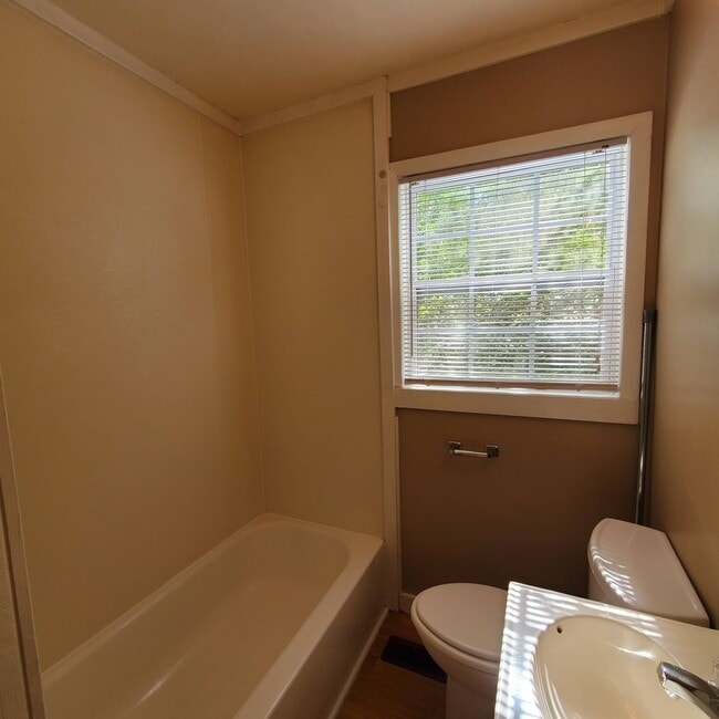 Building Photo - Spacious 3-Bedroom Home with Fireplace, an...