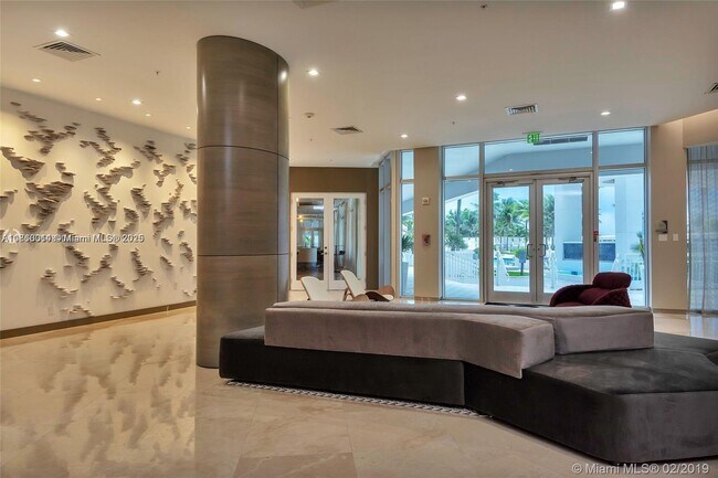 Building Photo - 10275 Collins Ave