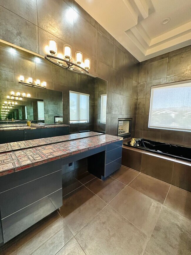 Building Photo - Stunning home with pool in prestigious Eagle Hills!