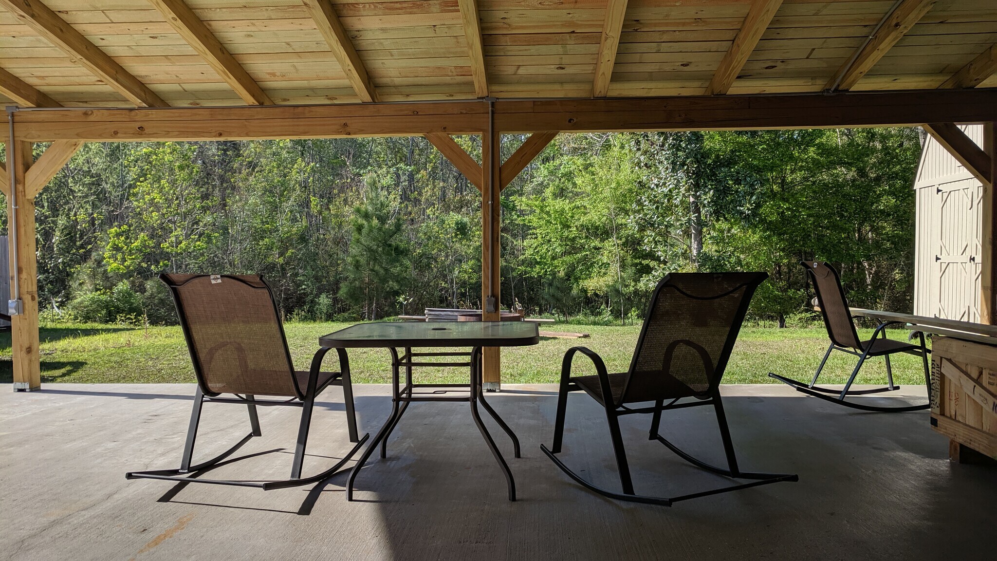 Covered patio with ceiling fans. - 742 Red Pine Dr
