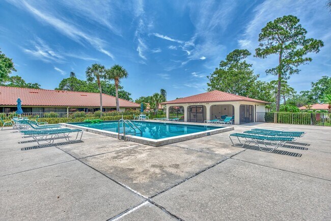 Building Photo - BEAUTIFUL 2 BEDROOM 2 BATHROOM + A DEN VILLA WITH GORGEOUS LAKE VIEWS!