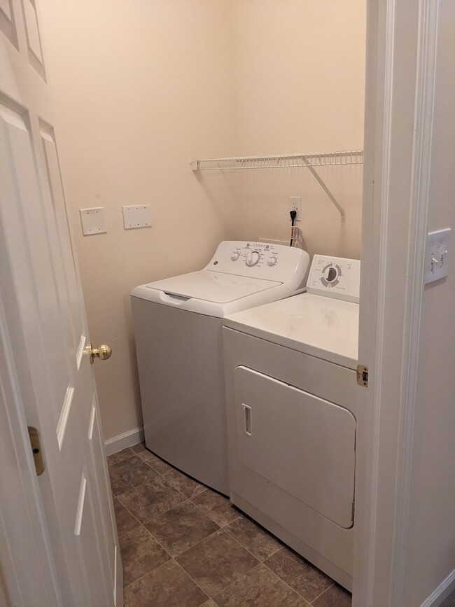 Full laundry room with washer and dryer. Both machines included for no additional cost! - 3881 E Barrington Dr