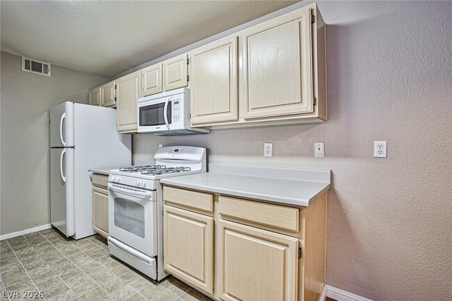Building Photo - 5125 W Reno Ave