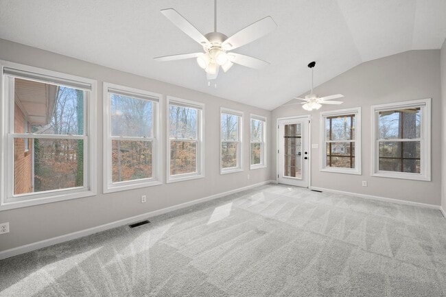 Building Photo - Spacious 4BR (or 3BR + Bonus) with 2 Living Rooms, Screened Porch & 4-Car Garage