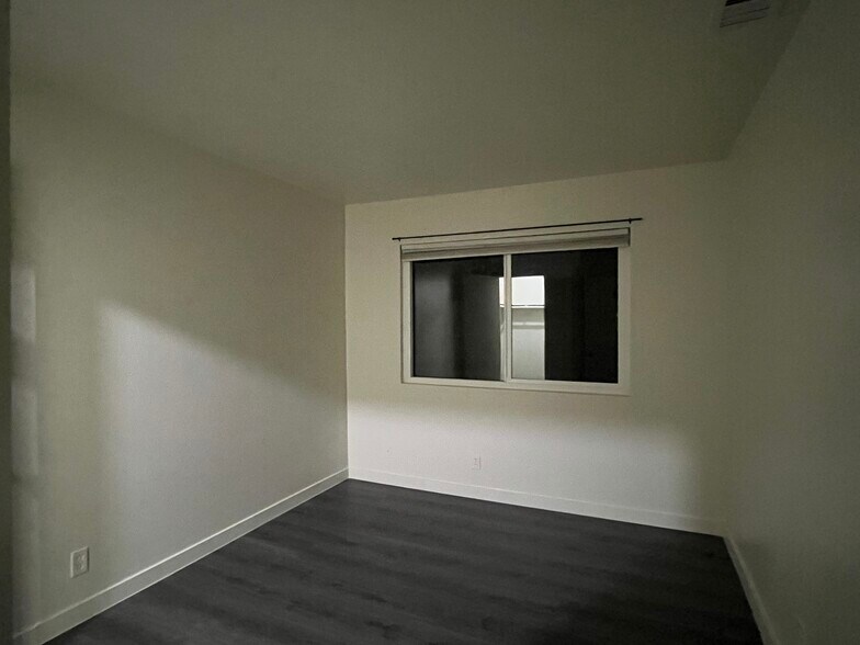 New energy effiecient sliding windows in Bedroom 2 - 1103 W Francis St