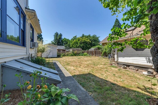 Building Photo - Historic Elegance Meets Modern Comfort – Beautifully Restored 1904 Victorian in the Heart of Fore...