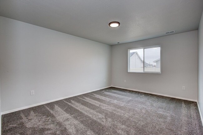 Building Photo - The 3 bedroom, 2 bedroom home also has a f...