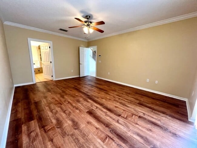 Building Photo - EAGLE CREEK LAKE NONA! WELCOME HOME! Beautiful water views! Spacious 2 story-3 bedroom 2.5 bath h...