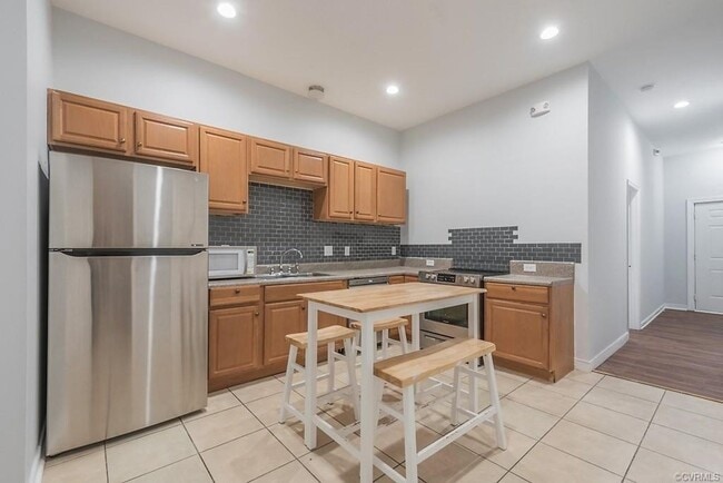 Building Photo - Newly Renovated 4 Bedroom | 4 Bath With Private Parking | Upper and Lower Covered Porches!