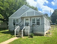 Building Photo - 1327 W 24TH St S
