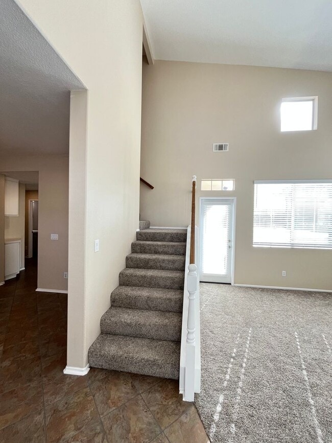 Building Photo - PICTURE PERFECT!  3 BR/3 BA END UNIT CONDO with DIRECT ACCESS 2 CAR GARAGE