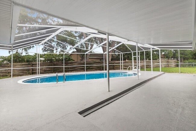 Building Photo - For Rent with Lawn and Pool Service Included!