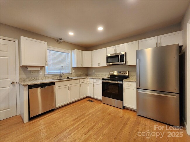 Building Photo - 6618 Hartsell Pl