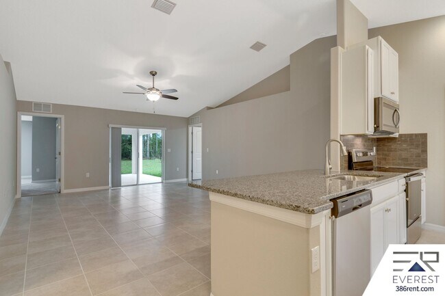 Building Photo - FULLY FENCED 4/3/2 IN DESIRABLE SEMINOLE WOODS