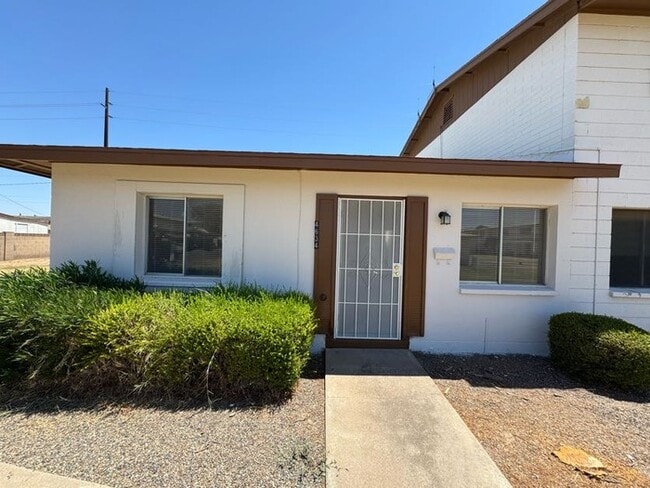 Primary Photo - Holiday Gardens Townhome