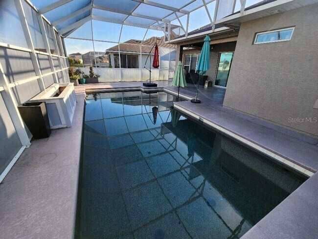 Building Photo - Beautiful Port Orange 4 Bedroom 2 Bathroom Pool Home