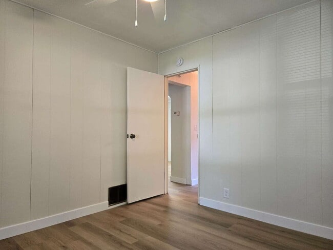 Building Photo - Room to Roam — Updated 2 Bed with Huge Yard & 2-Car Garage